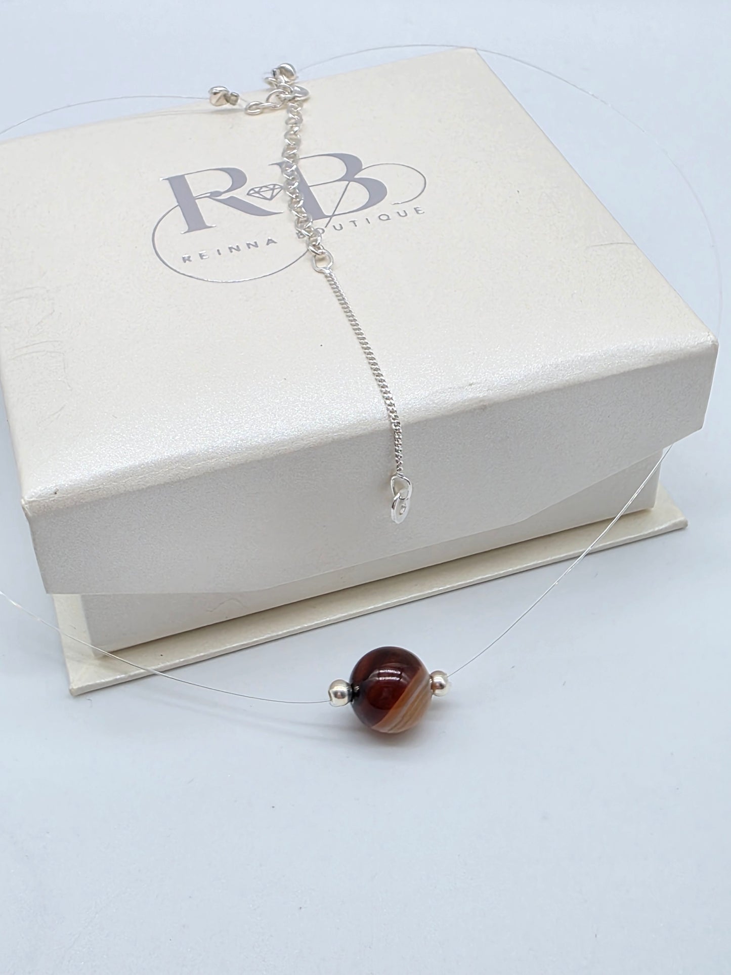 Minimalistiskt halsband i silver 925 med brun sten