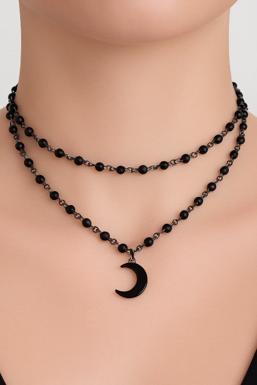 Dubbelhalsband med Svarta Kristaller & Halvmåne – Stil & Mystik i Ett