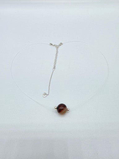 Minimalistiskt halsband i silver 925 med brun sten