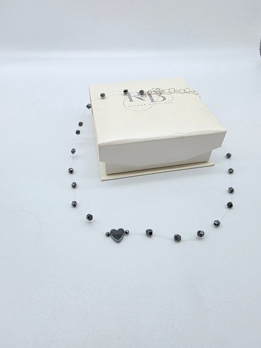 Floating halsband i silver 925 med hematit och hjärta