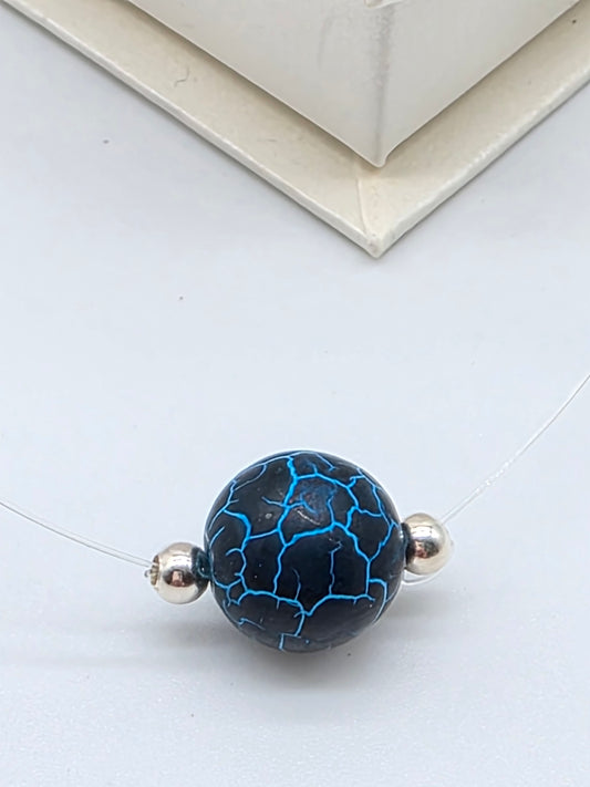 Minimalistiskt halsband i silver 925 med blå spräcklig natursten