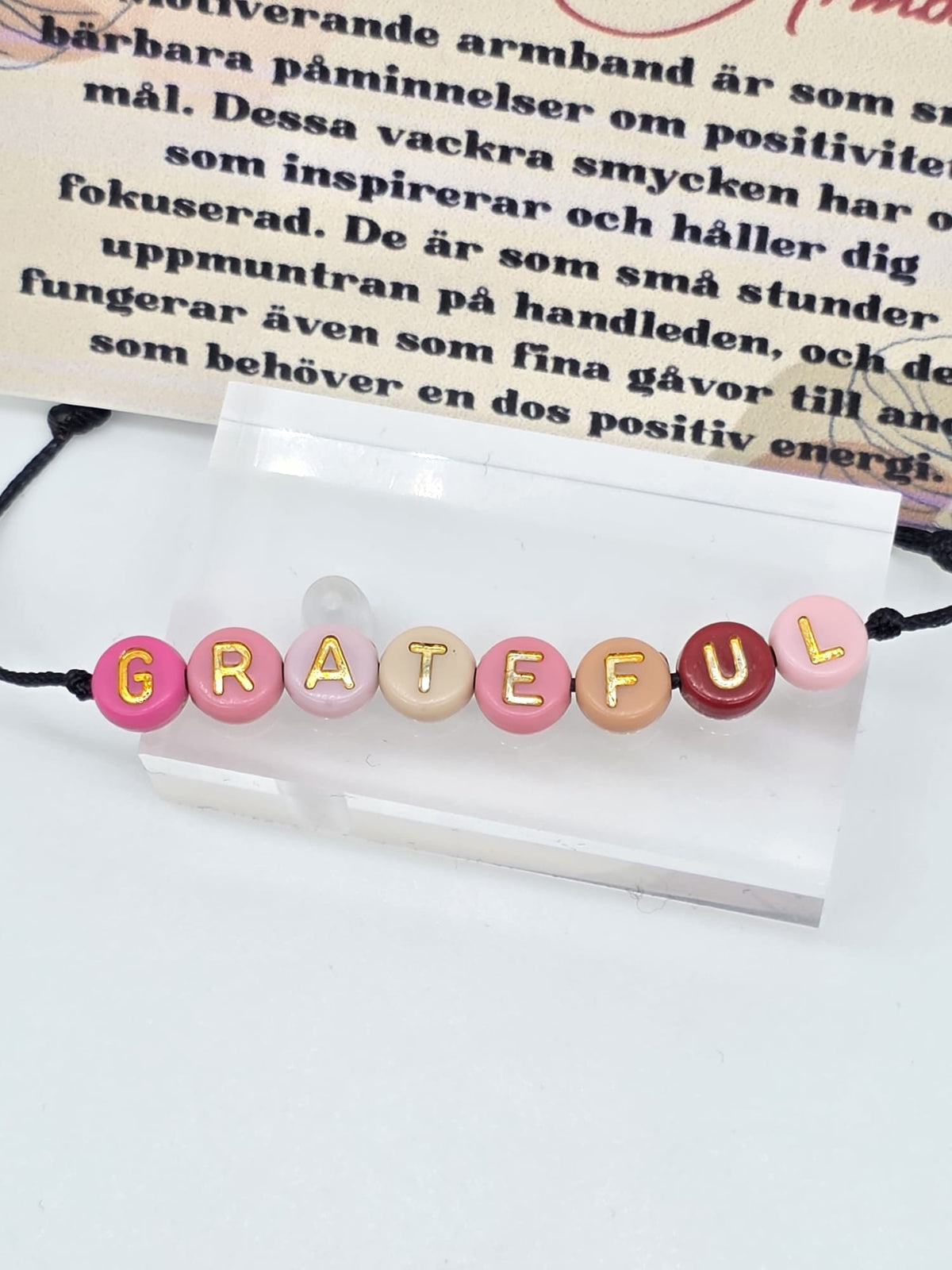 Motiverande armband